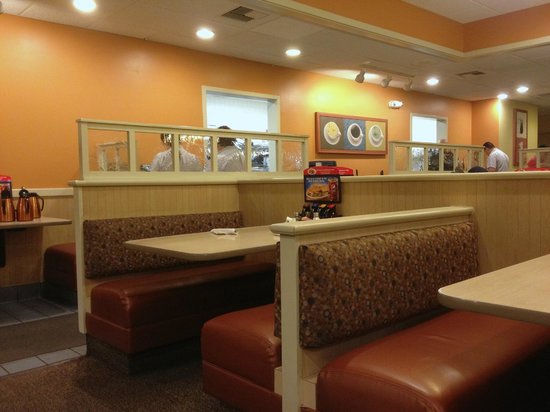 Dine-in experience at IHOP with a family enjoying their meal
