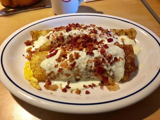 IHOP Bacon Temptation Omelette with bacon and tomatoes